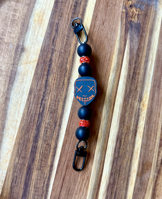 Orange Mask Kindle Strap