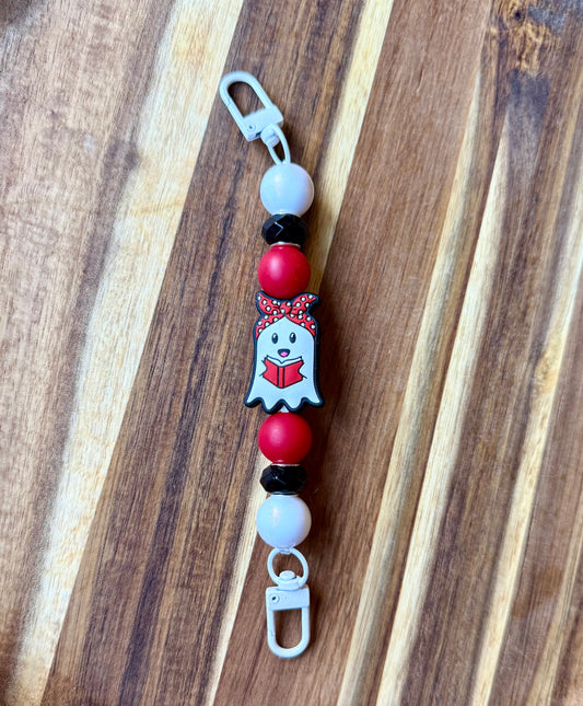 Bow Reading Ghost Kindle Strap