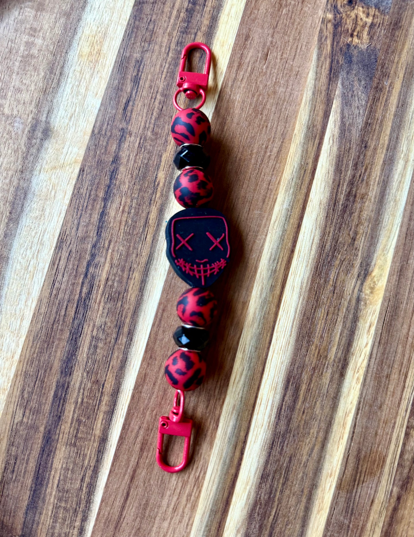 Red Mask Kindle Strap