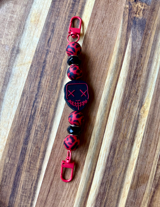 Red Mask Kindle Strap